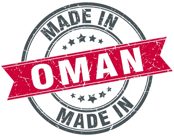 Made in Oman red round vintage stamp — Stock Vector