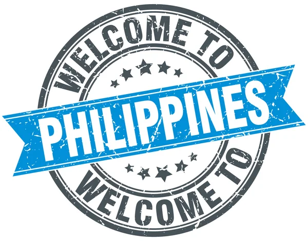 Benvenuto a Filippine blu rotondo timbro vintage — Vettoriale Stock