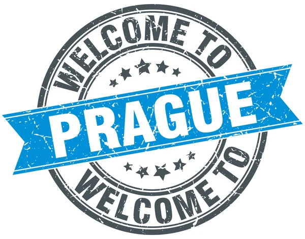 Benvenuto a Praga blu rotondo timbro vintage — Vettoriale Stock