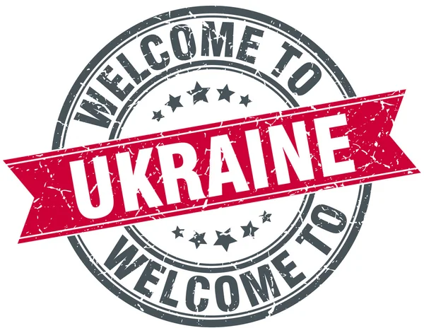 Benvenuto in Ucraina rosso rotondo timbro vintage — Vettoriale Stock