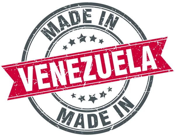 Сделанная в Венесуэле красная круглая винтажная марка — стоковый вектор