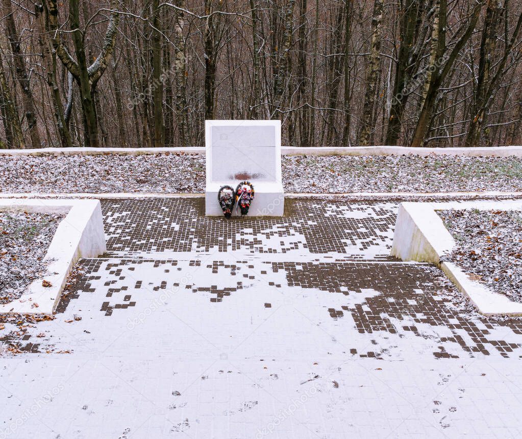 Memorial at site of mass destruction and burial of concentration camp prisoners. Winter day