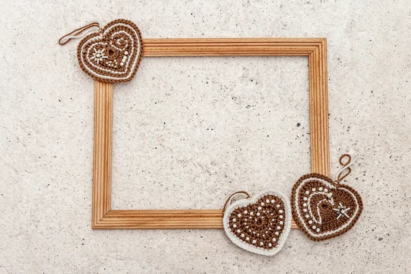 Valentine Day Background Crocheted Hearts Wooden Frame Light Matte Beige —  Fotos de Stock