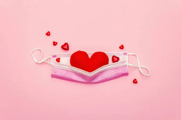 Red Heart Medical Protection Mask Light Pink Background Top View — 스톡 사진