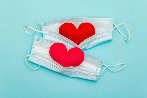Red Pink Hearts Medical Protection Masks Light Blue Background Top — 스톡 사진