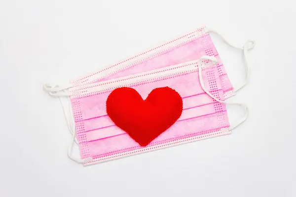 Red Heart Medical Protection Masks Isolated White Background Top View — Stockfoto