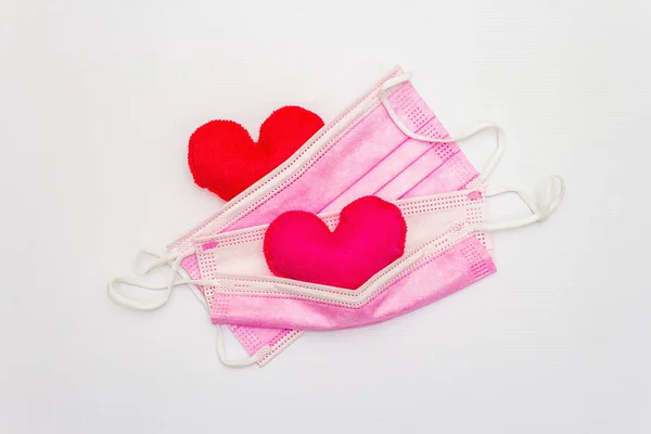 Red Pink Hearts Medical Protection Masks Isolated White Background Top — Zdjęcie stockowe