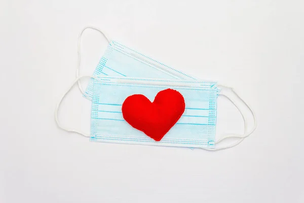 Red Heart Medical Protection Masks Isolated White Background Top View — Stockfoto