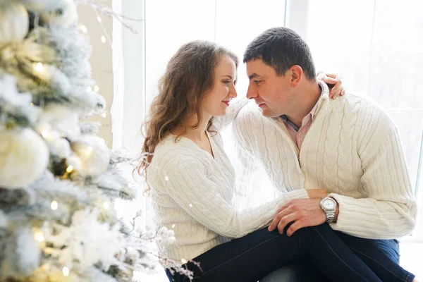 Portrait Young Couple Hugging Sitting Floor New Year Tree Background — Stock Photo, Image