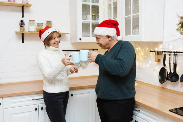 Happy Mature Couple Drinking Coffee Christmas Kitchen — Stock Photo, Image