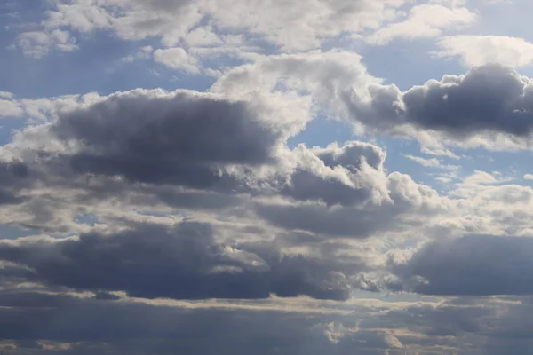 The evening sky after the rain. Spring sky with clouds.