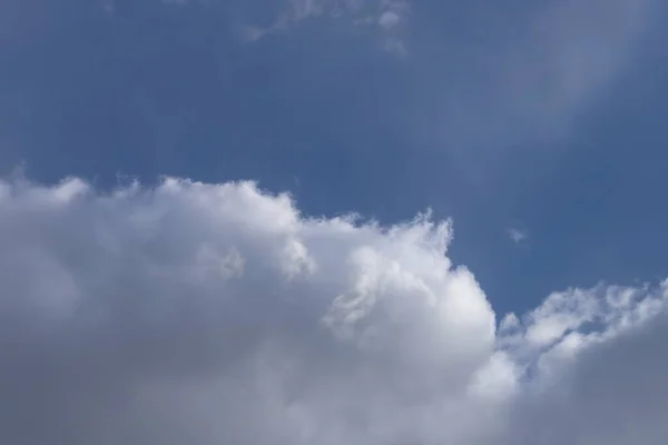 Blue spring sky and white clouds. Sky with clouds.