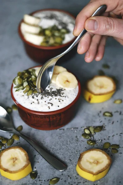 Chia pudding with pumpkin seeds and banana. Healthy breakfast or snack. Keto diet. Keto dessert. Sugar free dessert.