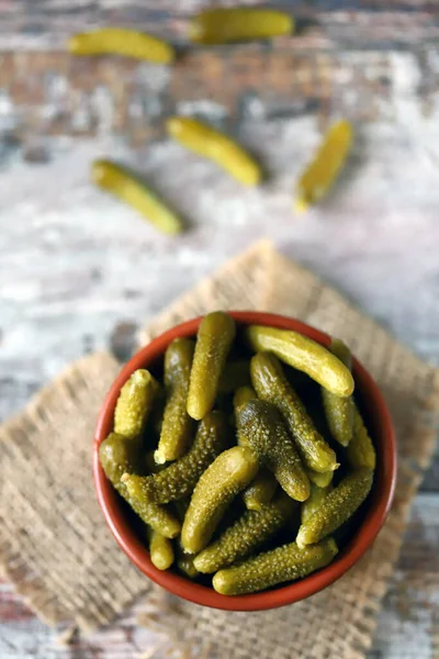 Pickled cucumbers in a bowl.