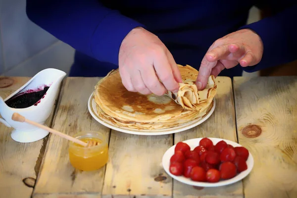 Selective Focus Man Eats Pancakes His Hands Plate Pancakes Strawberries — Stock Photo, Image