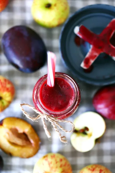 Apple plum smoothie. Making smoothies at home.