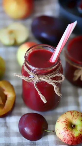 Apple plum smoothie. Making smoothies at home.