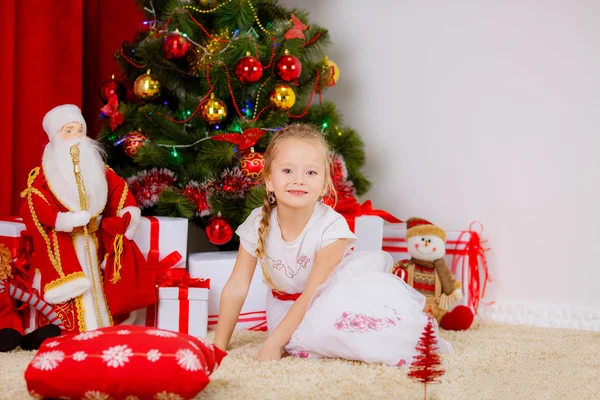 Girl and Christmas tree
