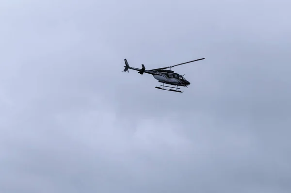 Private Helicopter in flight over New York.