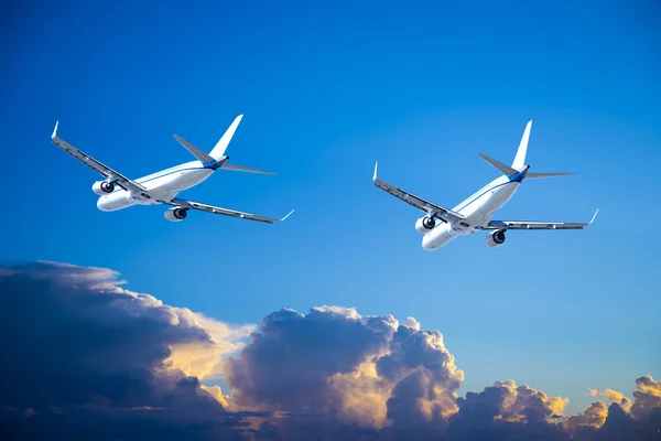 Flight training aircraft in blue sky