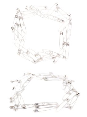 Emniyet pimleri farklı foreshortenings ayarla, beyaz arka plan üzerinde izole kare çerçeve yapılmış