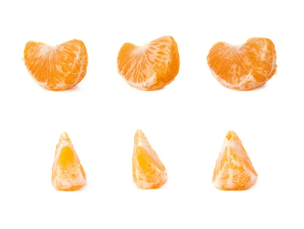 Segment delen van Tangerine geïsoleerd over de witte achtergrond — Stockfoto