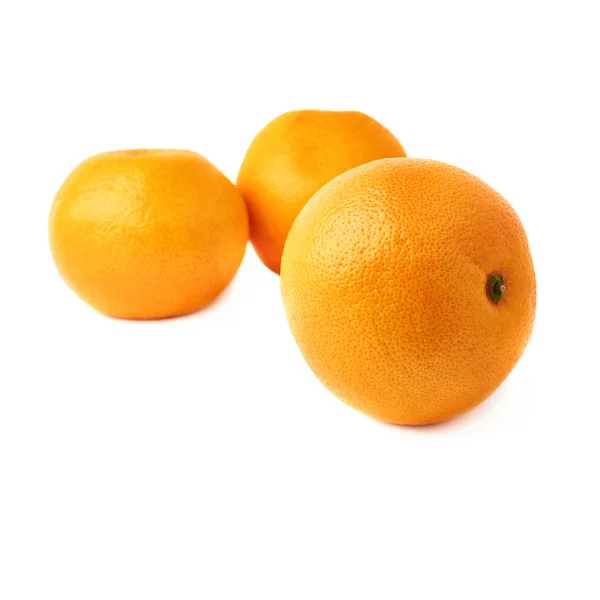 Pile of multiple fresh juicy grapefruits, isolated over the white background — Stock Photo, Image