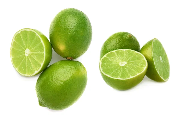 Composição de frutos de lima servida isolado sobre o fundo branco, conjunto de diferentes foreshortenings — Fotografia de Stock