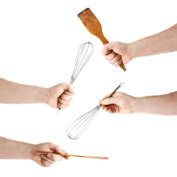 Рука держит кухонный инструмент, композиция изолирована на белом фоне — стоковое фото