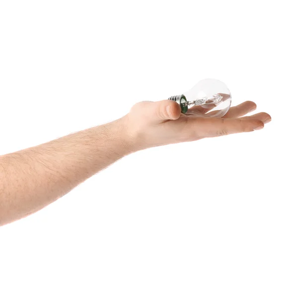 Mão segurando uma lâmpada, composição isolada sobre o fundo branco — Fotografia de Stock
