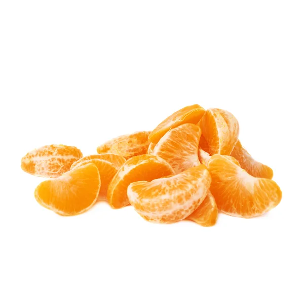 Pile of slice sections of tangerine isolated over the white background — Stock Photo, Image