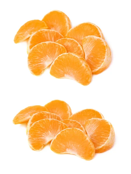 Pile of slice sections of tangerine isolated over the white background — Stock Photo, Image