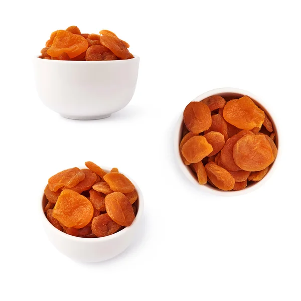 Dried orange apricots over white background — Stock Photo, Image