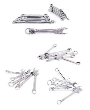 Beyaz arka plan üzerinde izole wrenchs metal aletler yığını kümesi