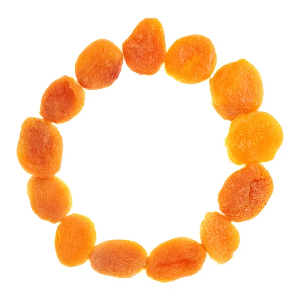 Albaricoques anaranjados secos sobre fondo blanco — Foto de Stock