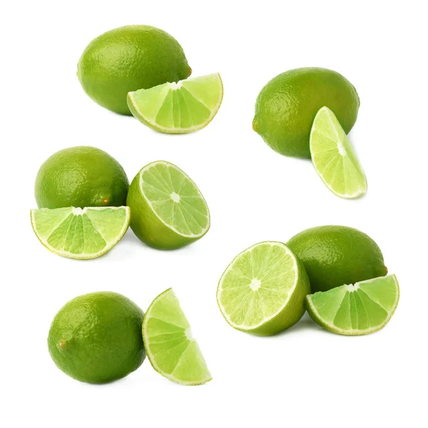Composição de frutos de lima servida isolado sobre o fundo branco, conjunto de diferentes foreshortenings — Fotografia de Stock
