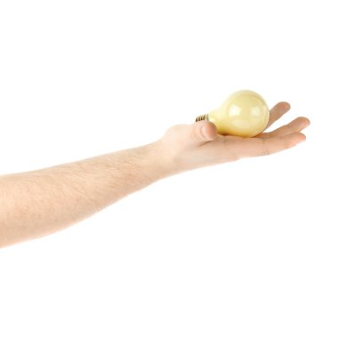 Bir ampul, beyaz arka plan üzerinde izole kompozisyon tutan el