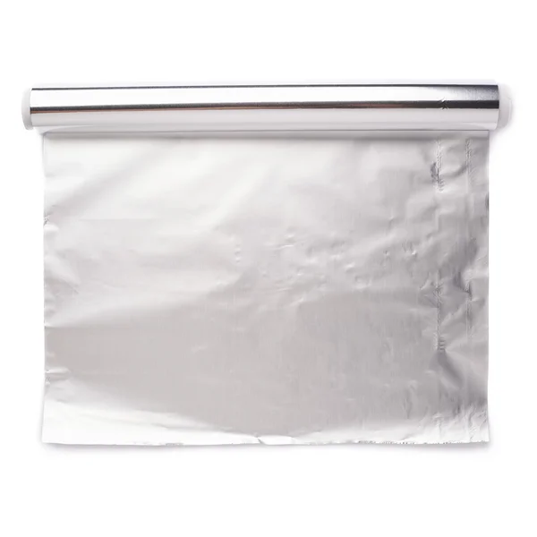 Roll of aluminium foil paper over isolated white background — Stock Photo, Image