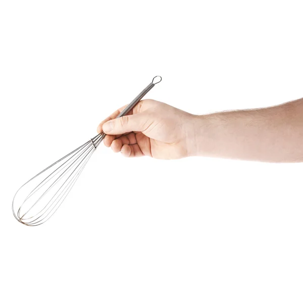 Hand holding a egg beater mixer whisk, composition isolated over the white background — Stock Photo, Image