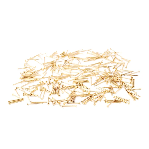 Scattered nails over surface isolated over white background — Stock Photo, Image