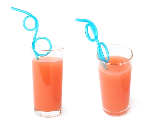 Tall glass filled with the grapefruit juice and curved blue plastic drinking straw inside. composition isolated over the white background — Stock Photo, Image