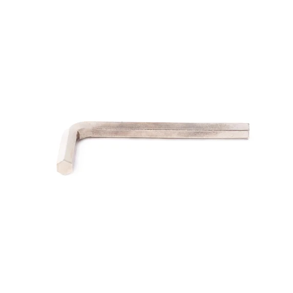 Шестигранный металлический ключ на белом изолированном фоне — стоковое фото
