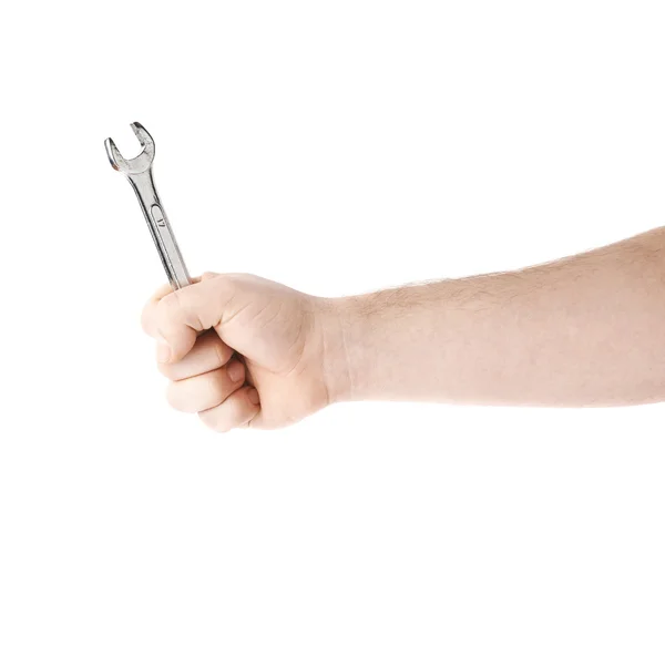 A csavarkulccsal szolgáló eszköz kézben tartásával, a fehér háttér felett izolált kompozíció — Stock Fotó