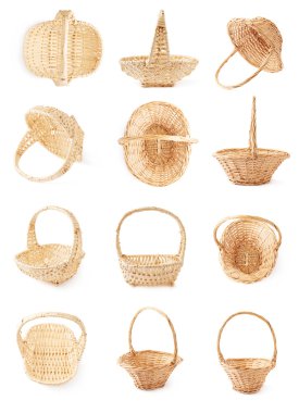 Set of brown wicker baskets isolated over the white background