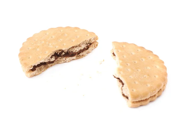 Gebroken in stukken cookie geïsoleerd op de witte achtergrond — Stockfoto