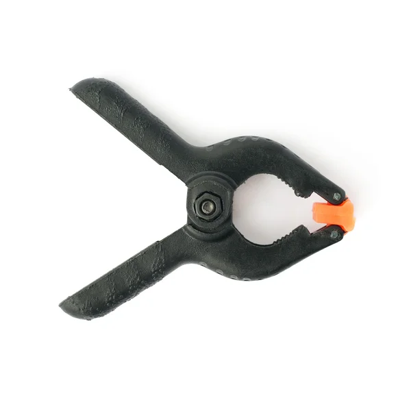 Clamp with orange plastic jaws, isolated over the white background — Stock Photo, Image