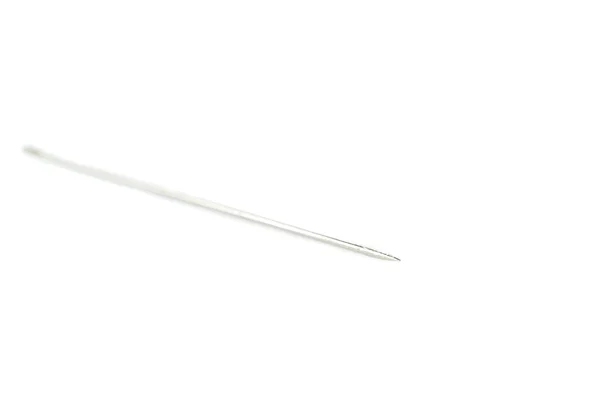 Small needle isolated over the white background — Stock Photo, Image