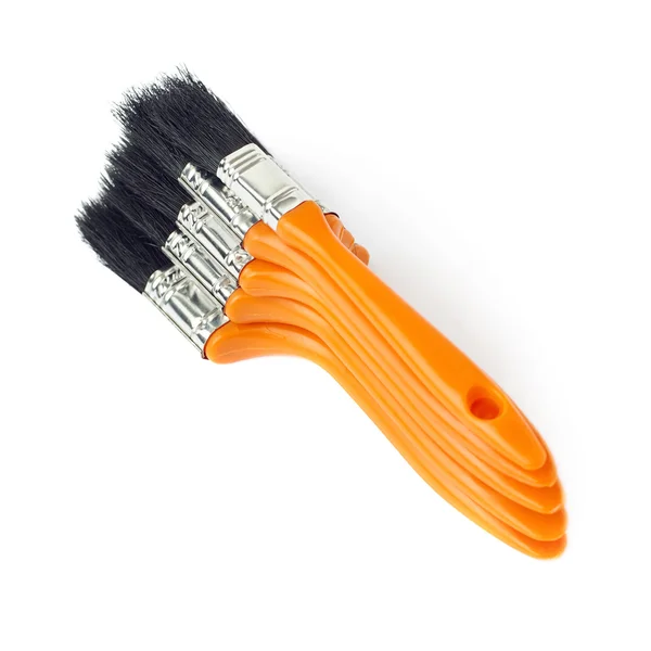 Pile of Paint brushes over isolated white background — Stock Photo, Image