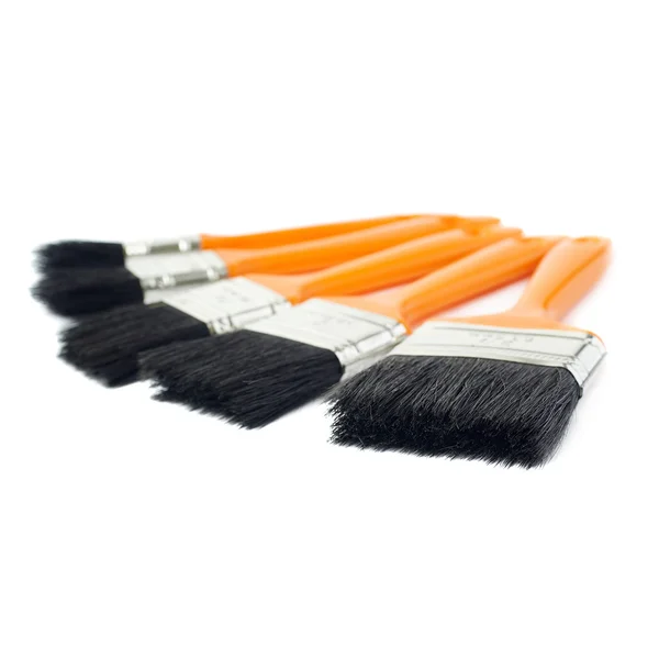 Pile of Paint brushes over isolated white background — Stock Photo, Image