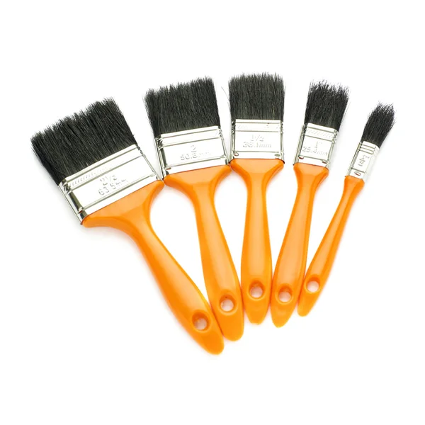 Pile of Paint brushes over isolated white background — Stock Photo, Image